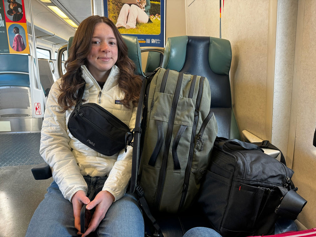 Train travel with the Pakt 45L Travel Backpack