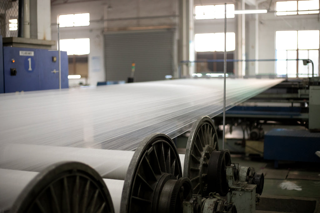 rPET threads at the fabric manufacturer 